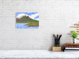 The A4 print of Lake in the Mountains hung above a desk