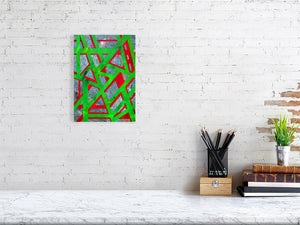 Bold green and red lines create a grid design over a sponged background of various colours